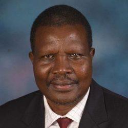 Professor Elijah Songok MBS, Director of the Kenya Medical Research Institute (KEMRI), official portrait.